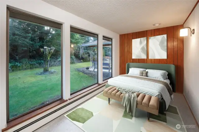 Bedroom 3 with large picture windows overlooking back yard