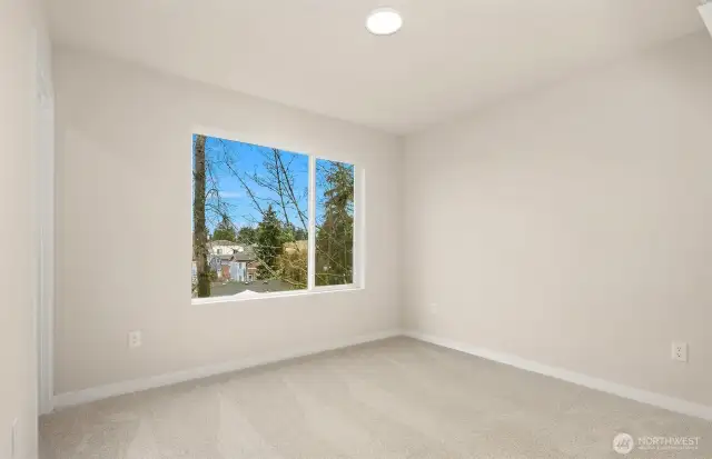 Photos are of a similar home design in the community