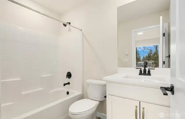 Photos are of a similar home design in the community