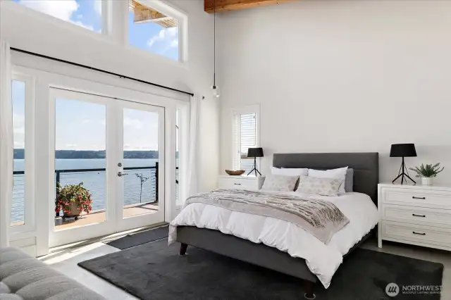 The Primary ensuite #1 is 15.4' x 16’ and bedroom features 11' wide closets with double-high shelving & vaulted ceiling.