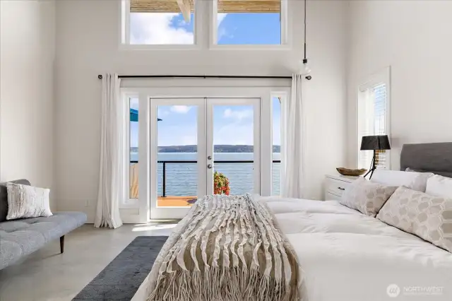 Primary ensuite #1 enjoys French doors that open to the deck, & strategically placed windows for light and cross-ventilation and of course the view!