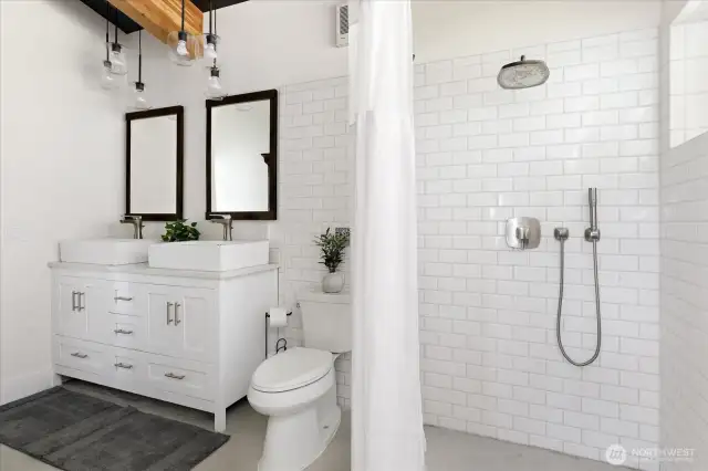 Primary Suite #2 bathroom is also elegant and refined.