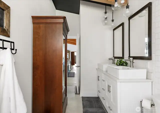 Sophisticated Bathroom and Charm looking out to kitchen from Primary Suite #2 bathroom.