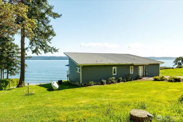 Propane-fueled BBQ, generator, and cement board siding with metal roof ensure you're ready for every season.