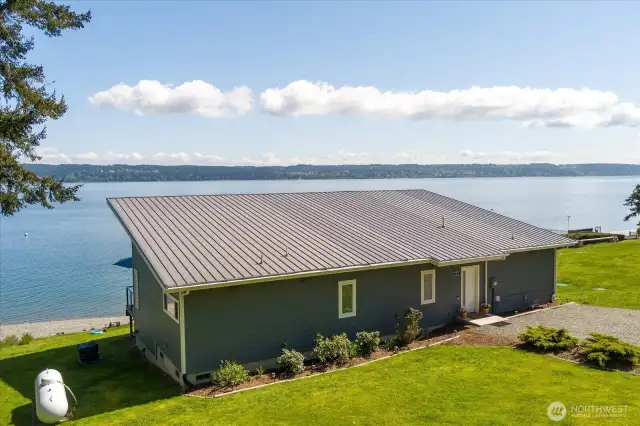 This property offers serenity, self-sufficiency, and unmatched beauty. Propane is hooked up to Barbecue and insert in the home. NOTE: Generator is also fueled by this propane tank!