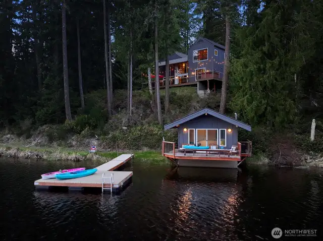 Newer marine dock. Boat house with power and deck.