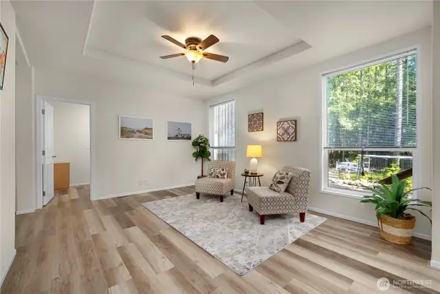 Large family room. Tray ceiling with fan.