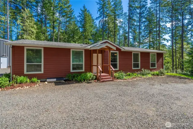 Built in 2022, this 1620 sq ft manufactured home is on 2.18 acres in Poulsbo WA.