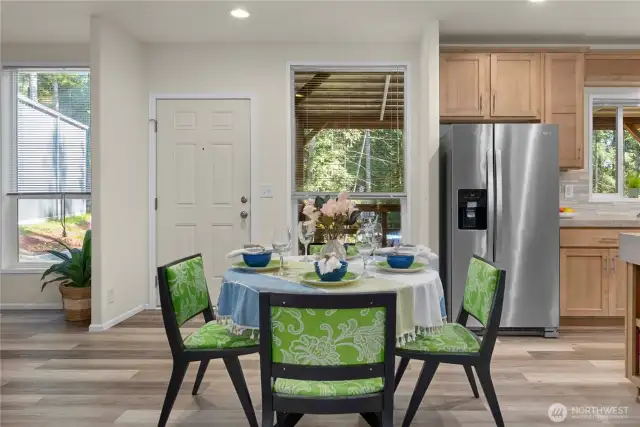 Dining room with back door to the deck.