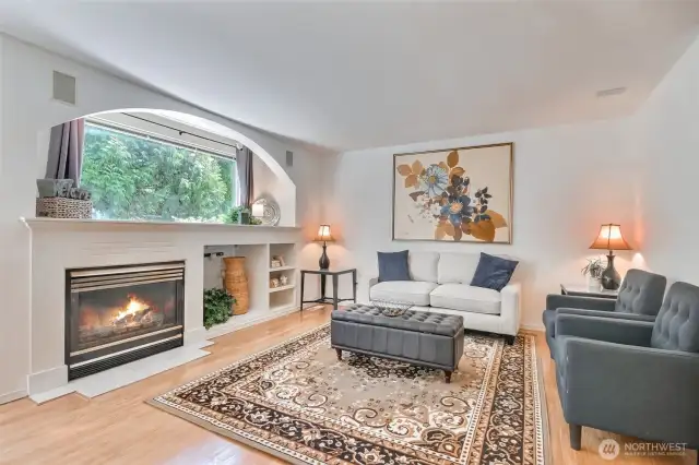The living room features a gas fireplace