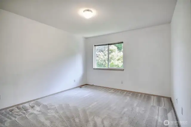Bedroom 1 is spacious and bright