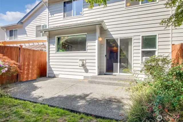The nice sized patio off the back sliding door