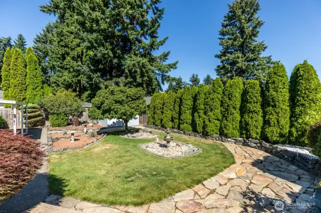 Meandering pathways in private fenced setting