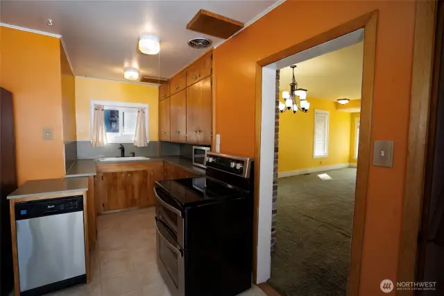 Efficient kitchen space with large breakfast nook filled with light!