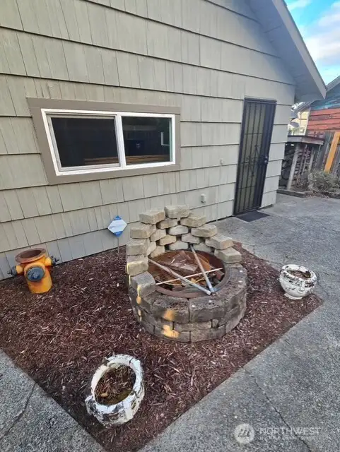 Patio with fire pit.