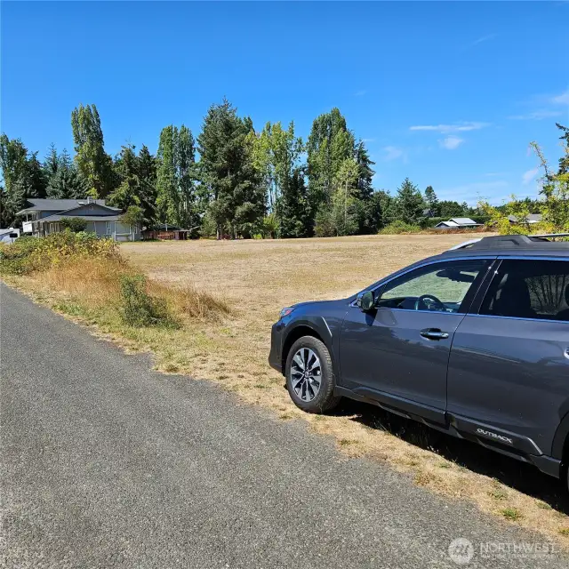From the southeast corner of the lot.  Park here.