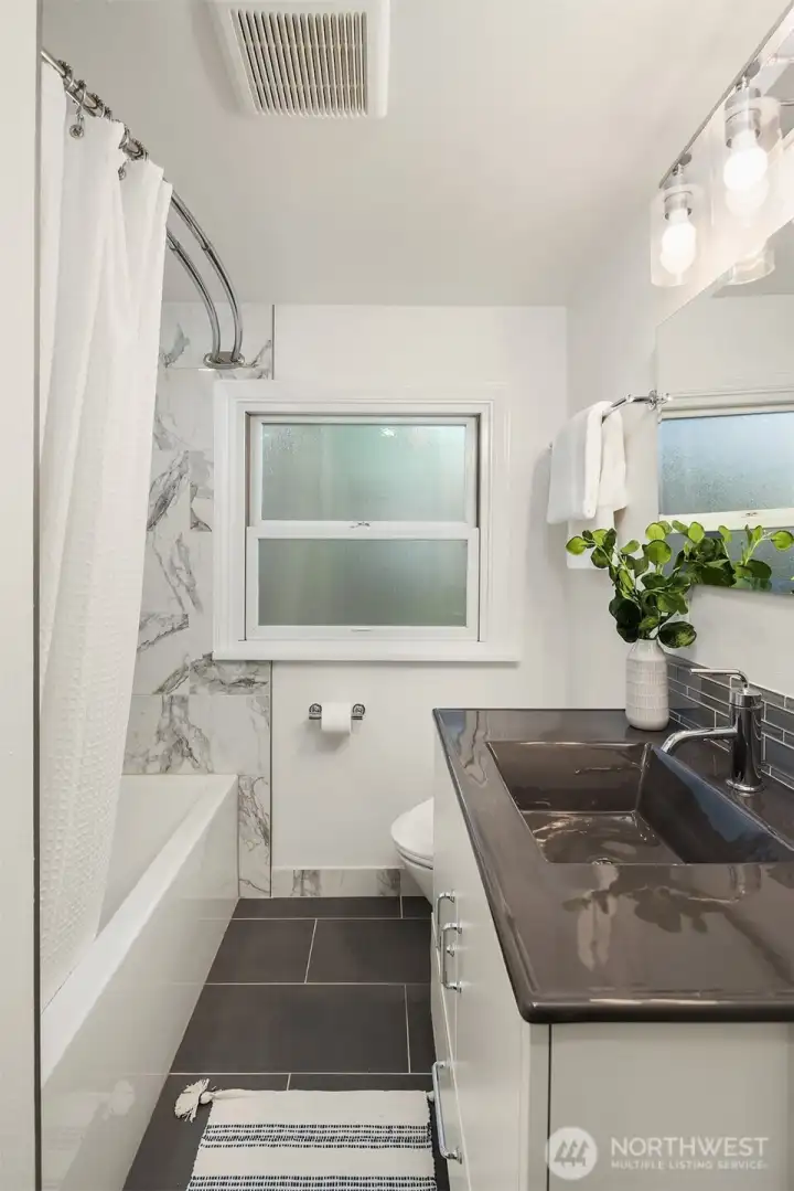 The main floor has an updated full bath.