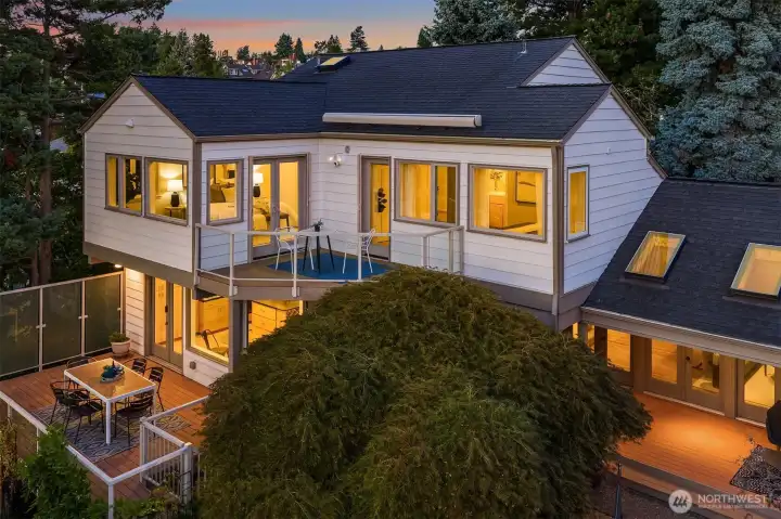 The back of the home.  Note the retracted electronic sun shade over the upstairs bedroom.