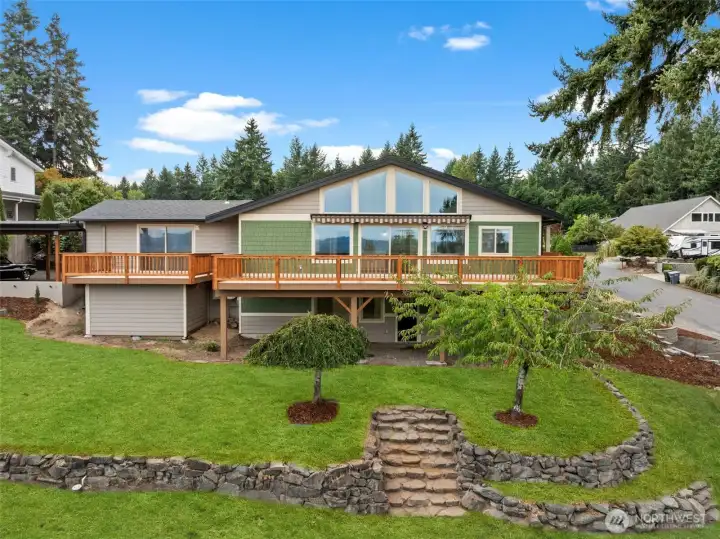 Windows and a wraparound entertainer's deck catch every angle of the view