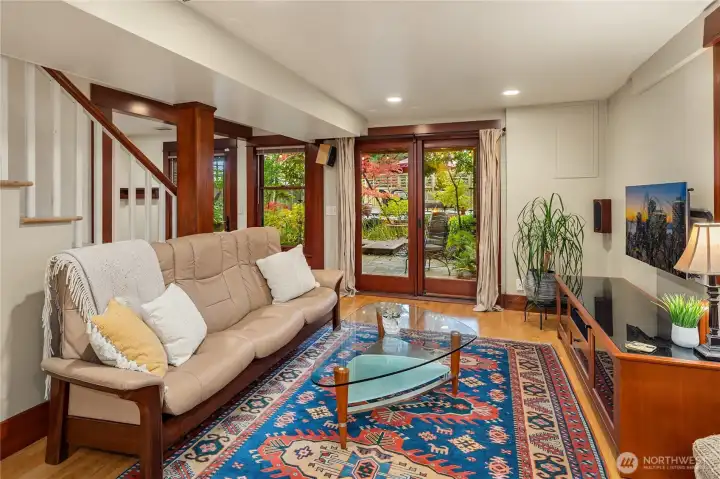 Lower level family room looking out to Japanese inspired rear yard