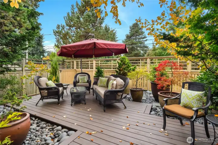 Roof deck with river rock “moat”. Landscaping and containers irrigated by sprinkler system.