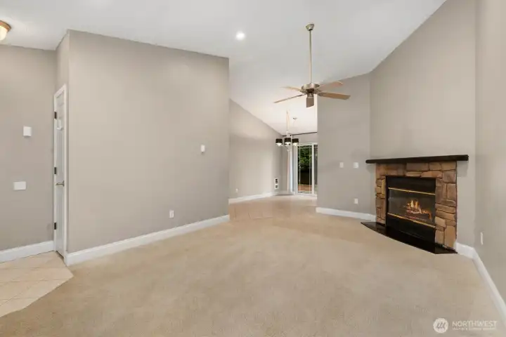 Gas fireplace with fan helps heat home quickly.