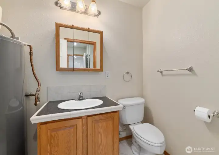 Half bath with heated floors.