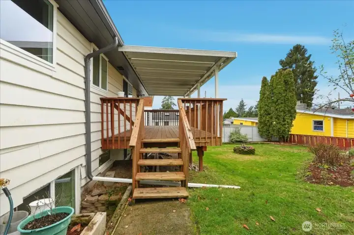 Stairs off deck leading to the backyard