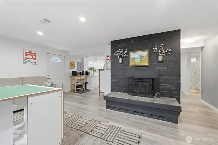 Wood burning fireplace on lower level