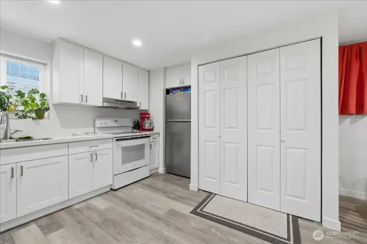 lower level kitchen with laundry center