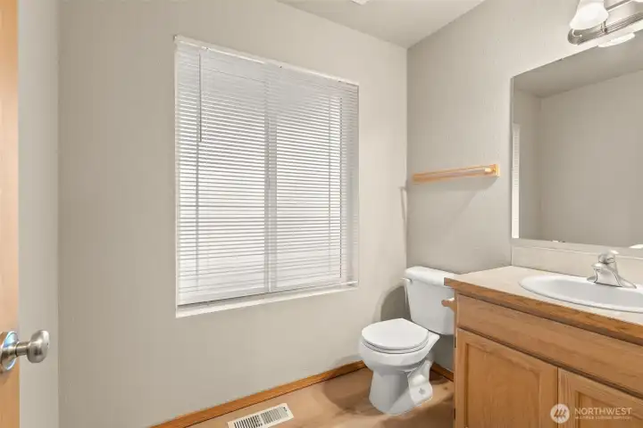 Half bath on main floor, perfect for visiting guests.