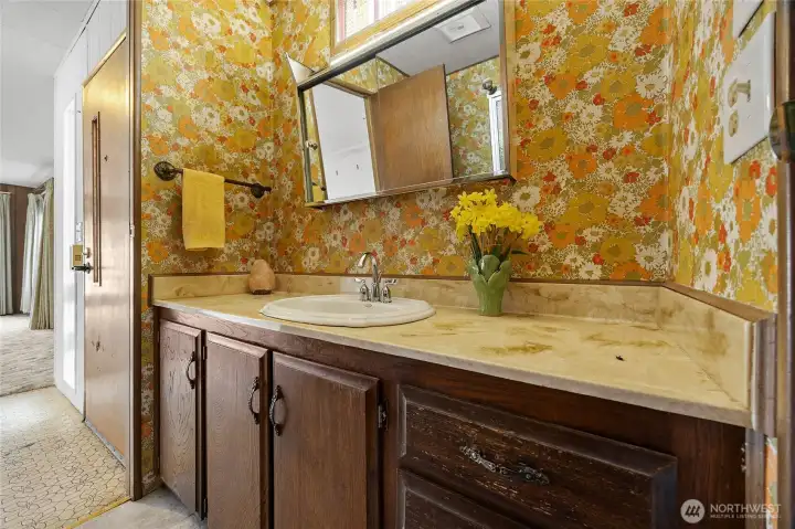 3/4 bathroom off 2nd bedroom has 2 doors for entry with one from the living room.