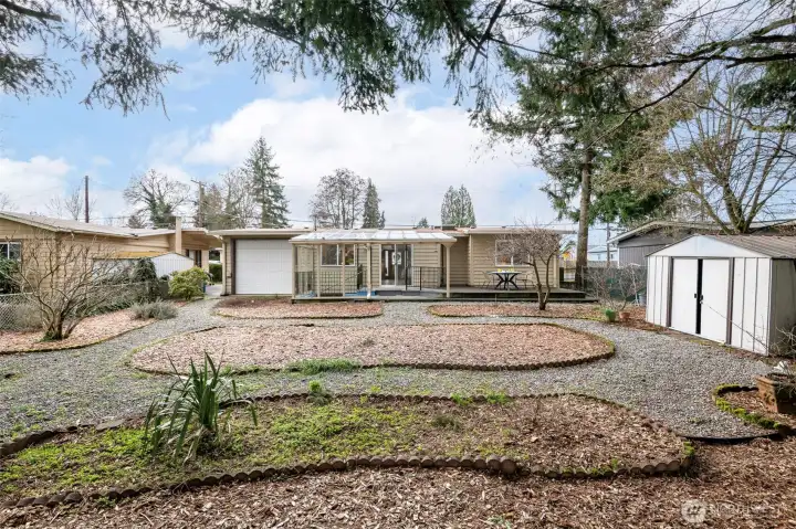 Love the idea of having an additional garage door in the back of the home.