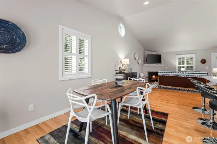 Room for traditional dining space plus counter seating at the island.