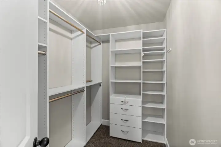 walk in closet in the primary suite