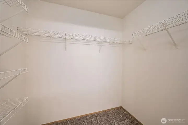 Primary walk in closet.