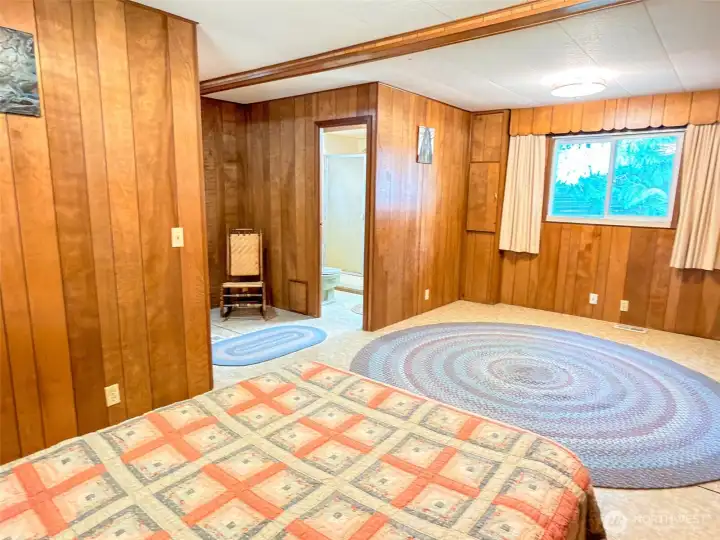 Entry into the 3/4 bath and space to the right for an office or sitting area.