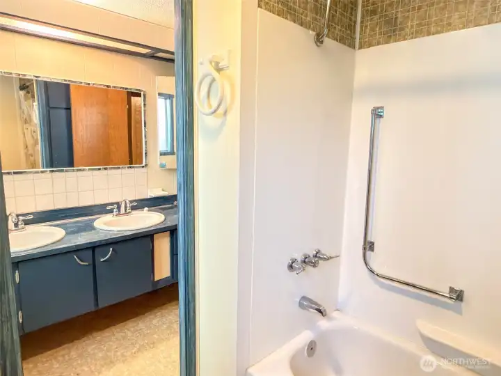 Separation of toilet and bath/shower from double vanity.