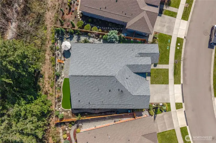 The oversized lot is situated on an extra deep permanent greenbelt. Meticulously landscaped while still low maintenance. Fully irrigated & fenced, landscape lighting front & back.