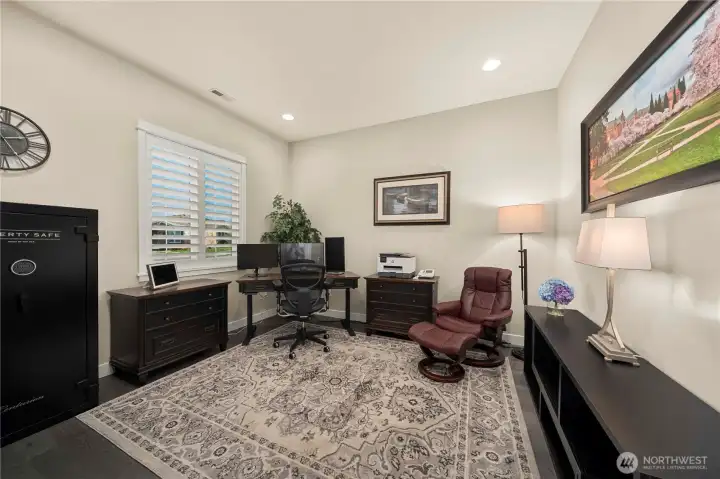 Glass French doors open to this oversized den or office. Many people use this as a spillover 3rd bedroom as well!