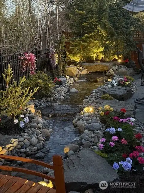 Beautiful exterior lighting throughout the front and back yards.