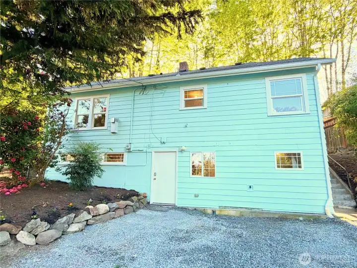 Side of house and parking area