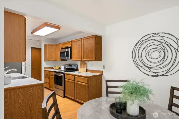 Your dining space is adjacent to the kitchen and creates a space for daily meals or entertaining.