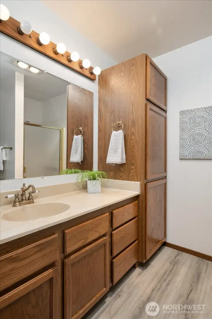 Storage and space is not a concern in the primary bathroom!