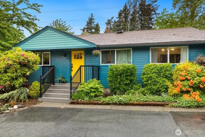 Vibrant home is freshly painted and full of life.