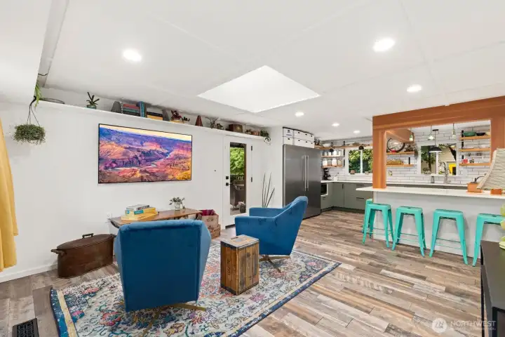 The living room opens into the eat-in kitchen to create a feeling of spaciousness and connection.