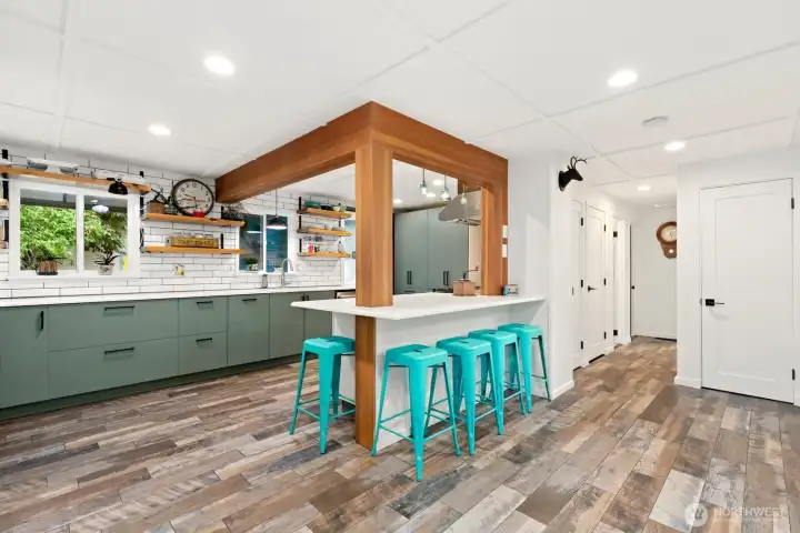 The kitchen is the heart of the home! Bedrooms and storage down the hall.