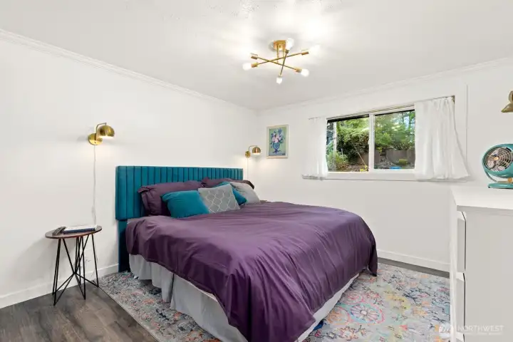 Primary Bedroom is well lighted with room for cabinets and bedside tables.