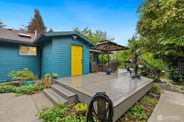 Through the laundry room, step outside to the amazing DOUBLE SIZE deck.  You can host a party for ALL your friends here!