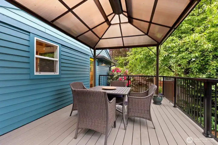 Enjoy a private dinner on the patio, surrounded by greenery.